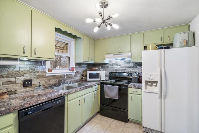 kitchen featuring green cabinetry, tasteful backsplash, sink, and black appliances