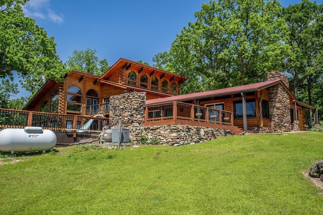 241 Nine Center Ct, Reeds Spring, MO 65737 - rear view of property featuring a lawn, a chimney, metal roof, and log exterior