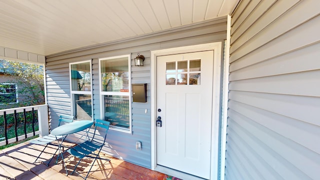 entrance to property with a porch