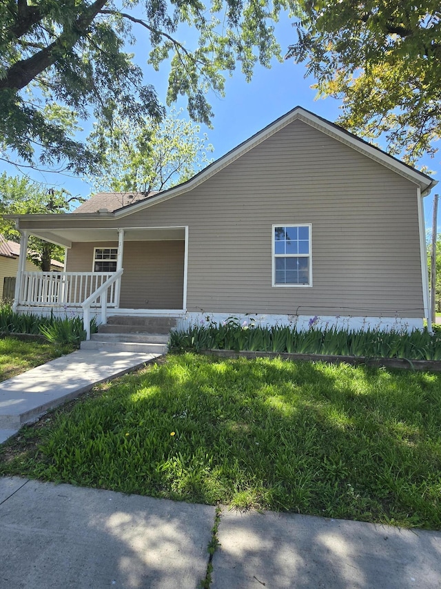 312 Frisco St, Monett, MO 65708 - view of home's exterior featuring a porch