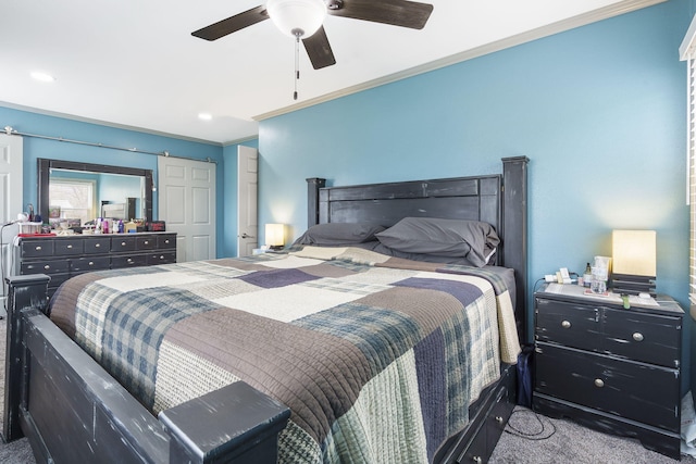 carpeted bedroom with crown molding and ceiling fan