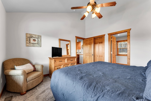 bedroom featuring high vaulted ceiling, ceiling fan, and carpet flooring