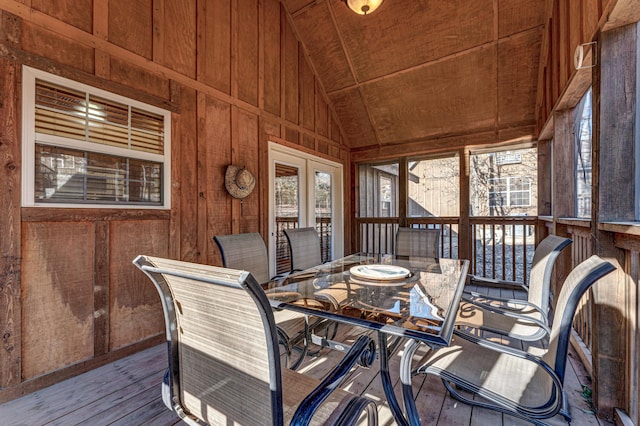 sunroom / solarium featuring vaulted ceiling and wooden ceiling