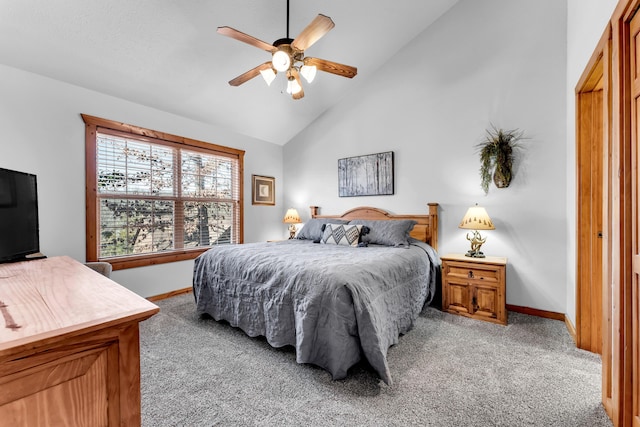 bedroom featuring ceiling fan, high vaulted ceiling, and light colored carpet