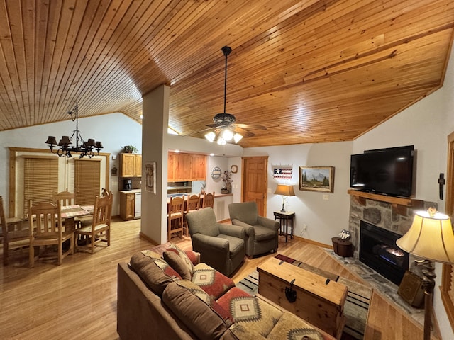 living room featuring light hardwood / wood-style flooring, a stone fireplace, vaulted ceiling, wood ceiling, and ceiling fan with notable chandelier