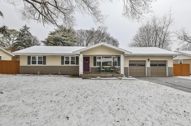 single story home featuring a garage