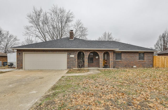 single story home featuring a garage