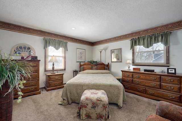 carpeted bedroom with a textured ceiling