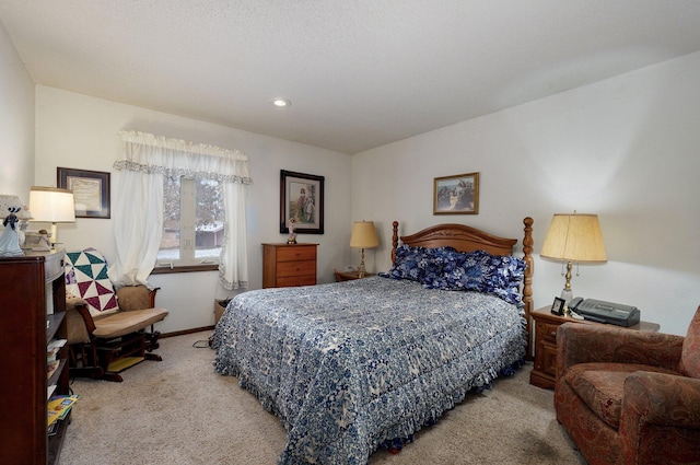 bedroom with light carpet