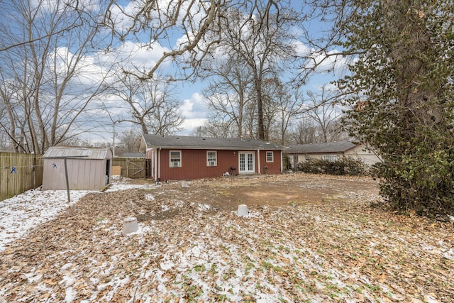 view of front of home with a storage shed