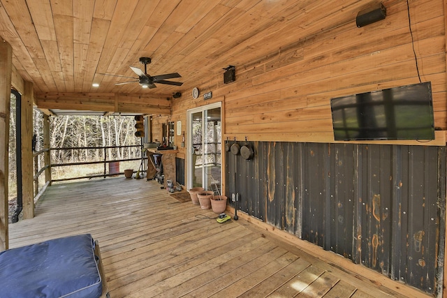 wooden deck with ceiling fan