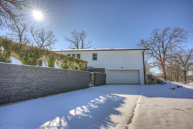 exterior space with a garage