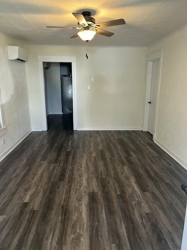 unfurnished room with dark hardwood / wood-style floors, a wall mounted air conditioner, and ceiling fan