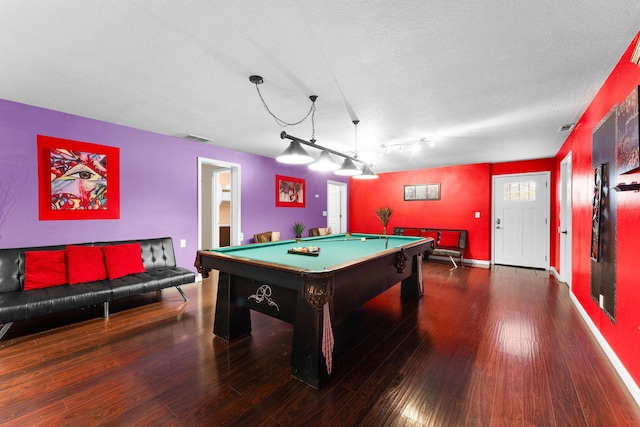 playroom with pool table, dark hardwood / wood-style flooring, and a textured ceiling