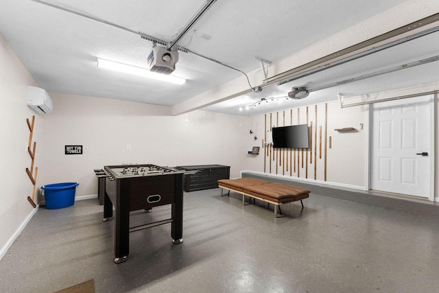 rec room featuring a wall mounted AC