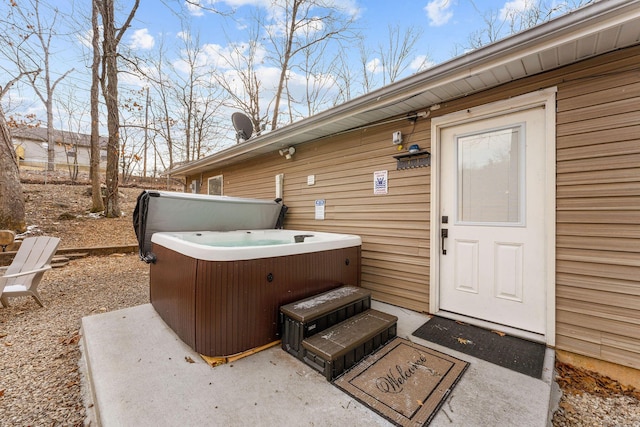 view of patio with a hot tub