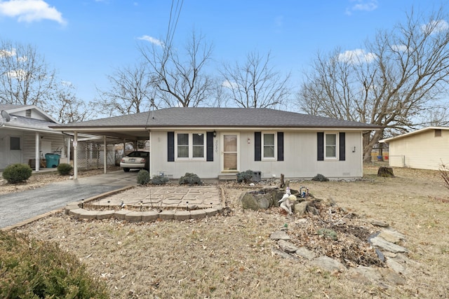 view of front of house featuring a carport