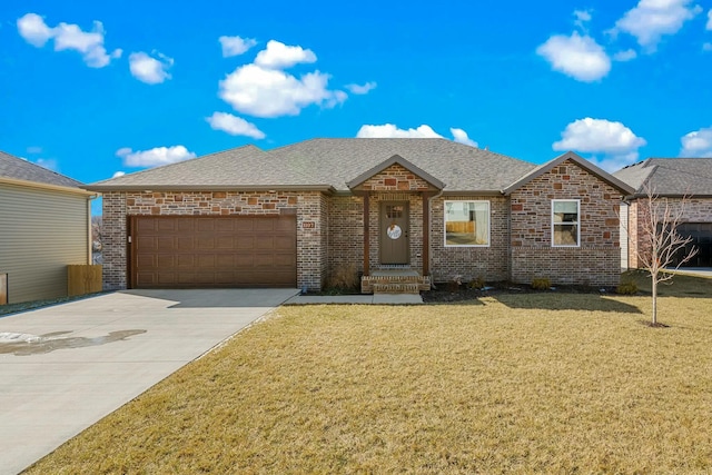 ranch-style house featuring a garage and a front yard