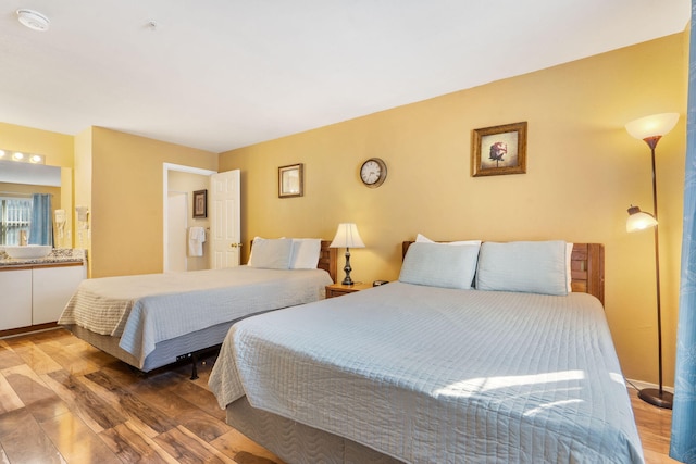 bedroom with wood-type flooring