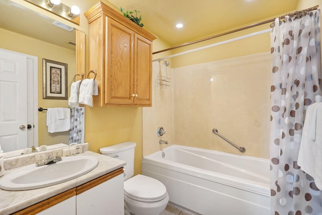 full bathroom with vanity, toilet, and shower / bath combo