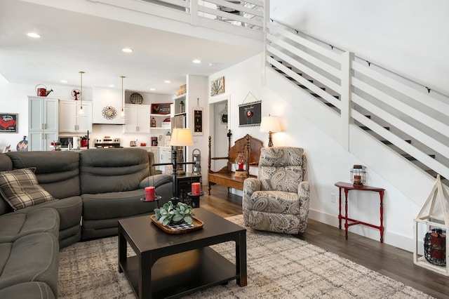 living room with dark wood-type flooring