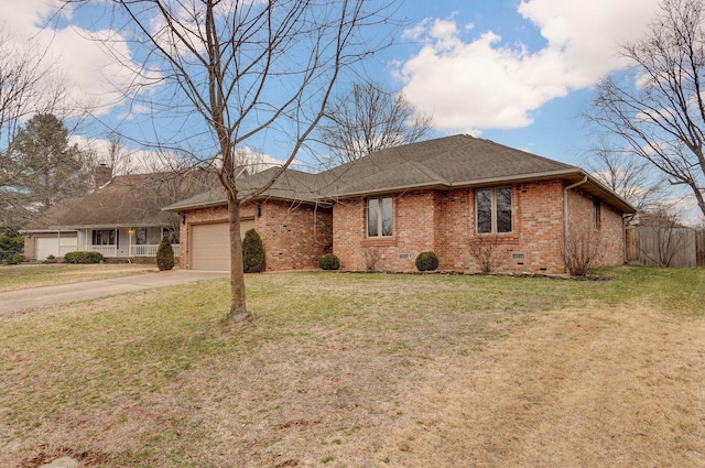 ranch-style home with a garage and a front yard