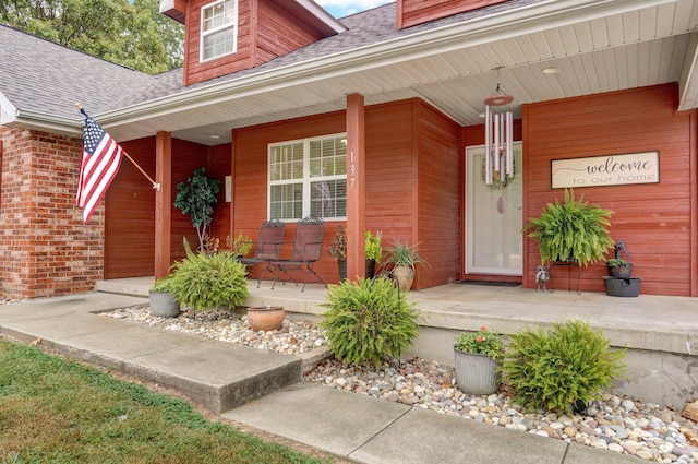 doorway to property featuring a porch