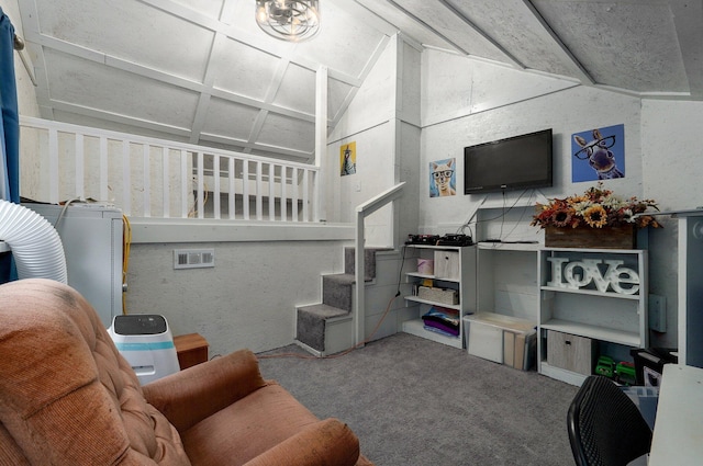 carpeted living room featuring vaulted ceiling