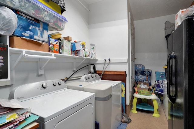 washroom featuring independent washer and dryer