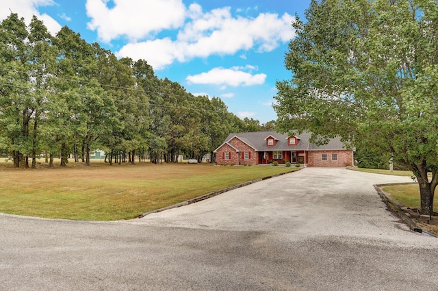 view of front of home with a front lawn