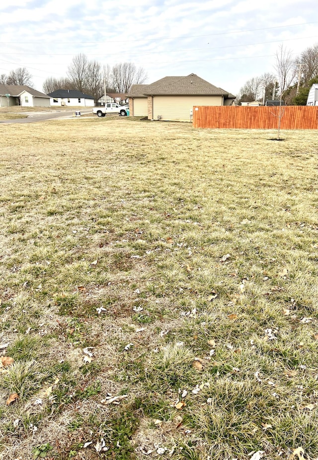 view of yard featuring fence