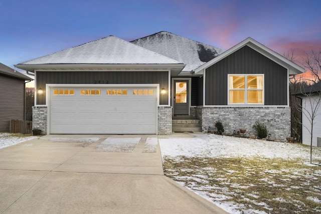 view of front of property with a garage