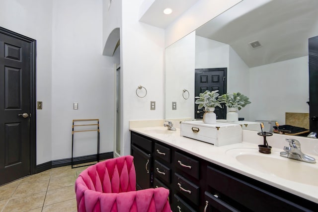 bathroom with vanity and tile patterned floors