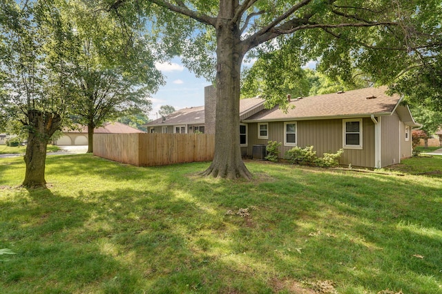 view of yard featuring central AC unit