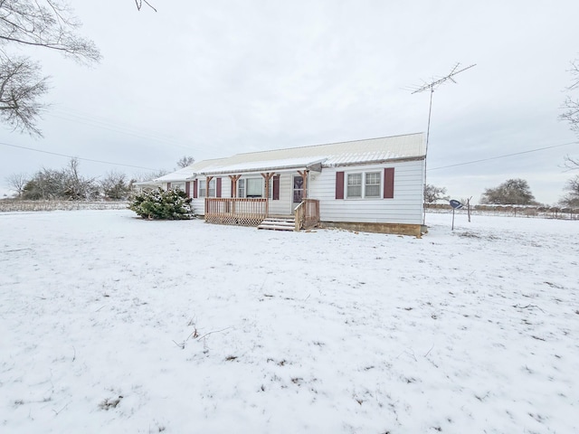 view of front of home featuring a wooden deck