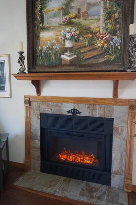 room details featuring a tile fireplace