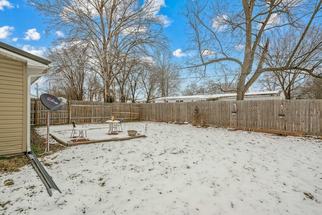 view of yard covered in snow