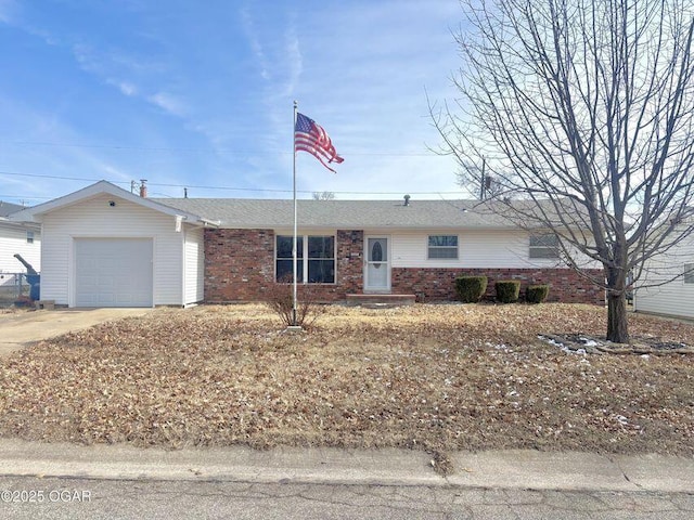 ranch-style house featuring a garage