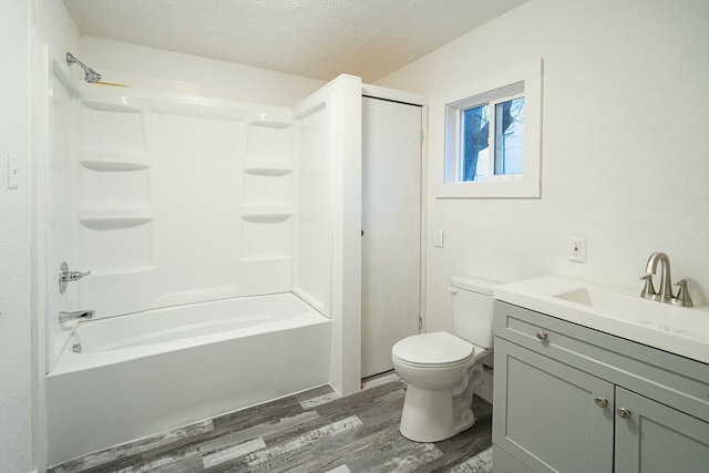 4229 County Road 2120, Pomona, MO 65789 - full bathroom with shower / bath combination, vanity, wood-type flooring, a textured ceiling, and toilet