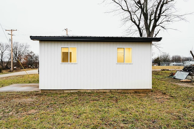 4229 County Road 2120, Pomona, MO 65789 - view of property exterior featuring an outbuilding and a lawn