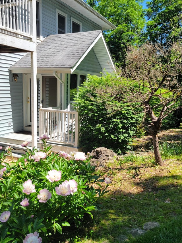 143 Arizona Dr, Branson, MO 65616 - entrance to property with covered porch and a shingled roof