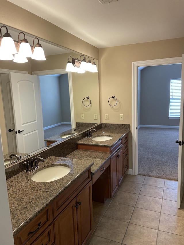 bathroom featuring tile patterned floors and vanity