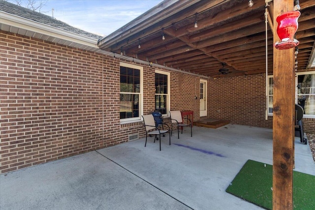 view of patio with ceiling fan