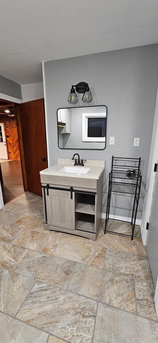 11498 Weatherman Dr, Mountain Grove, MO 65711 - bathroom featuring stone tile flooring and vanity