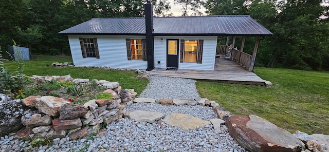 11498 Weatherman Dr, Mountain Grove, MO 65711 - view of front of home featuring a front yard and metal roof