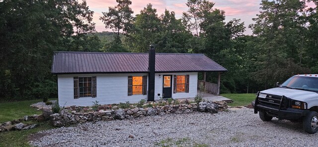 11498 Weatherman Dr, Mountain Grove, MO 65711 - view of front facade featuring covered porch and metal roof