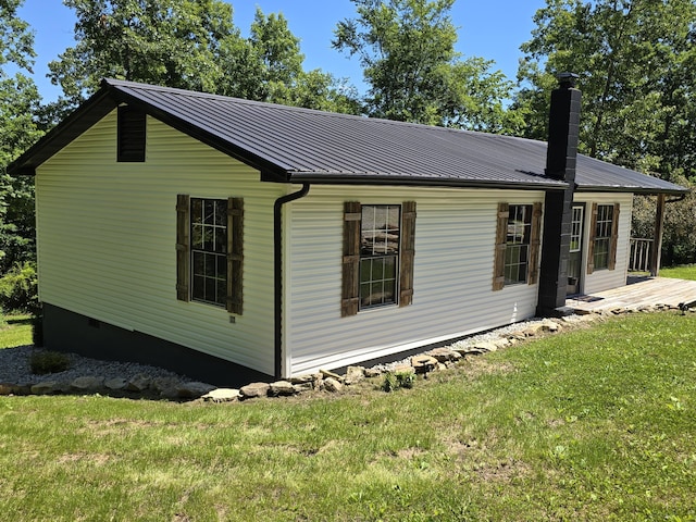 11498 Weatherman Dr, Mountain Grove, MO 65711 - back of property with a yard, metal roof, and a chimney