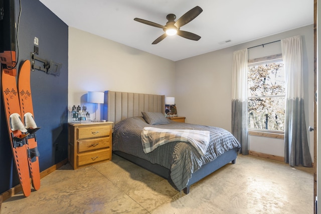 bedroom with a ceiling fan, visible vents, and baseboards