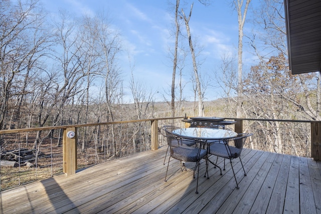 deck featuring outdoor dining space