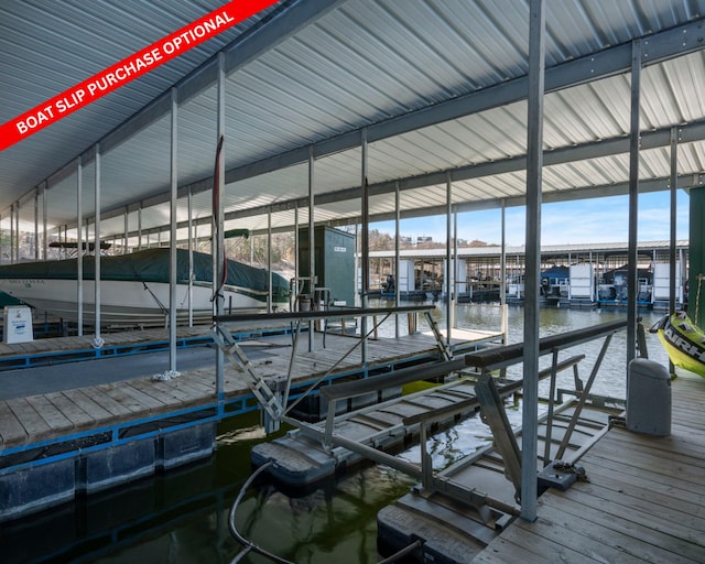 view of dock featuring a water view and boat lift